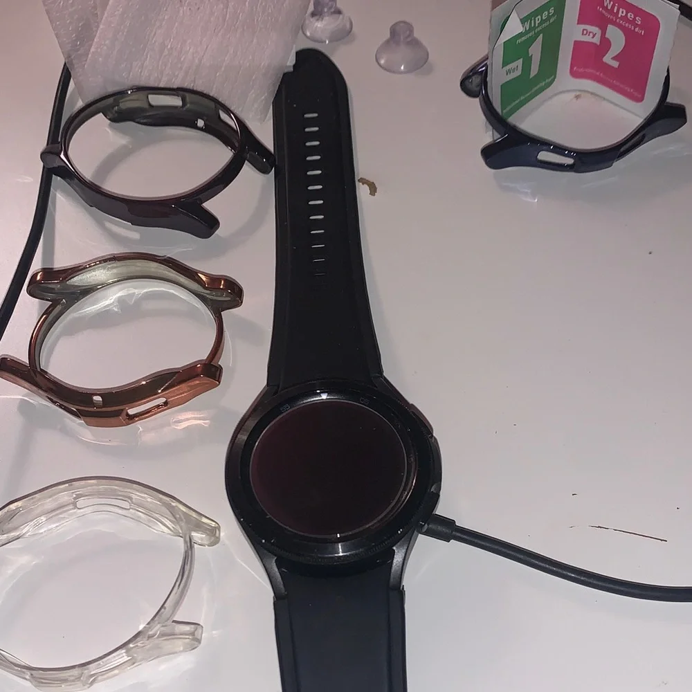 Samsung Black Smartwatch with Multiple Bands